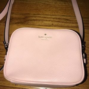 Light pink Kate Spade crossbody purse.